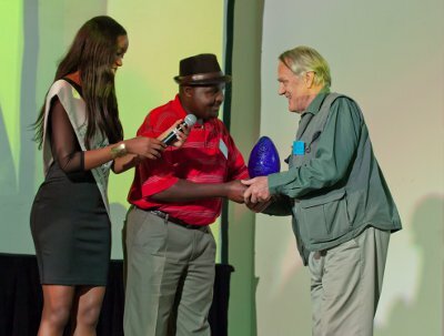 From left to right: Miss Earth princess Thobile Mchunu, and Mpho Tshitangoni, Director: Land Remediation from the Department of Environmental Affairs with Dr John Hanks, who was awarded the Lifetime Achievement Award at the Eco-Logic Awards 2013. Photo: Bernie Martins