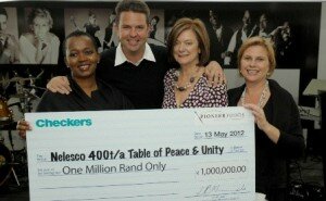 Table of Peace & Unity cheque handover. >From left to right:Lulu Khumalo - Pioneer Foods; Riaan Heyl - Pioneer Foods; Christine Cashmore - Table of Peace & Unity, Maryke Visser - Checkers